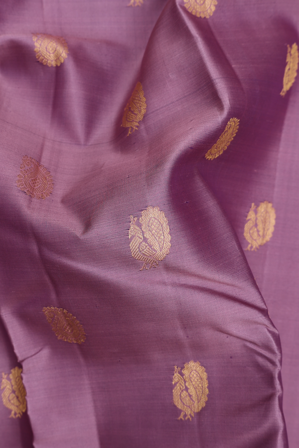 Kanchipuram Silk Saree In Dusty Lavender With Peacock Buttas