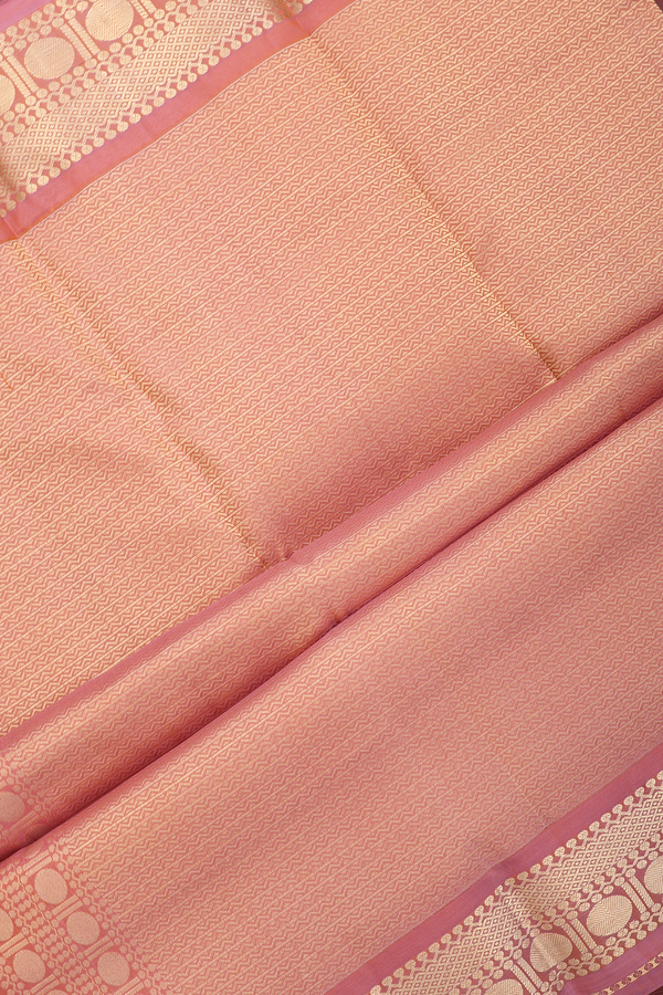Kanchipuram Silk Saree In Dusty Orange With Zari Buttas
