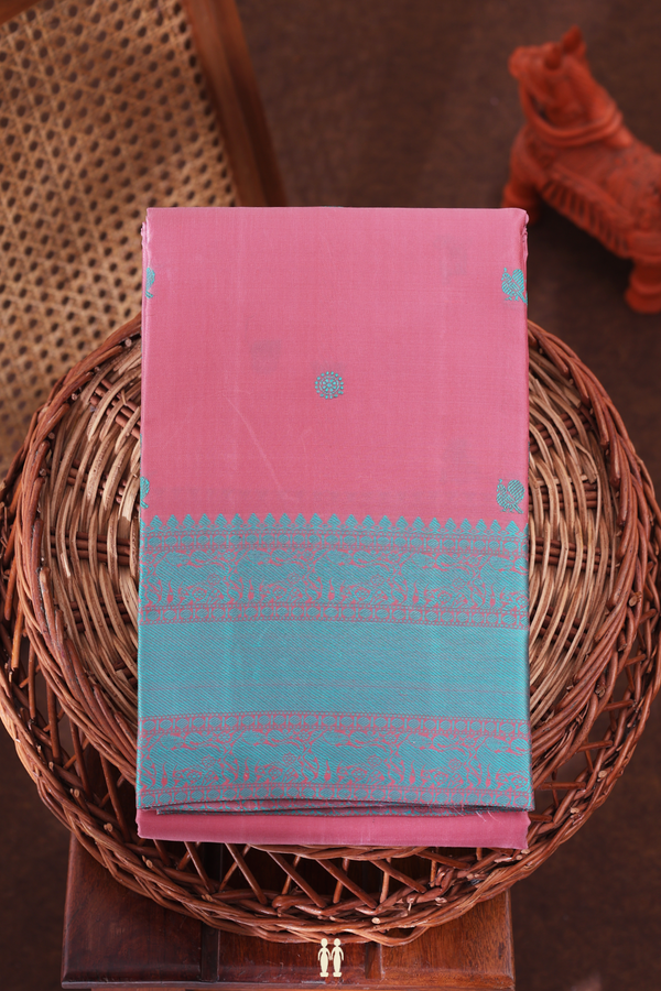 Kanchipuram Silk Saree In Dusty Pink With Peacock Buttas