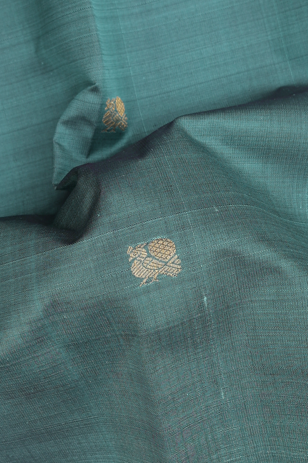 Kanchipuram Silk Saree In Dusty Teal With Peacock Buttas