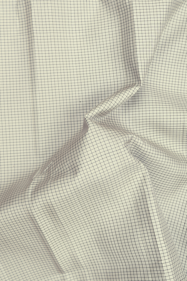 Kanchipuram Silk Saree In Cream Color With Checks Design