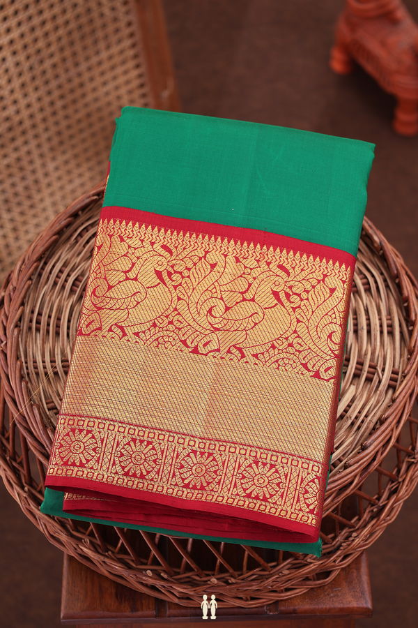Kanchipuram Silk Saree In Emerald Green With Contrast Border