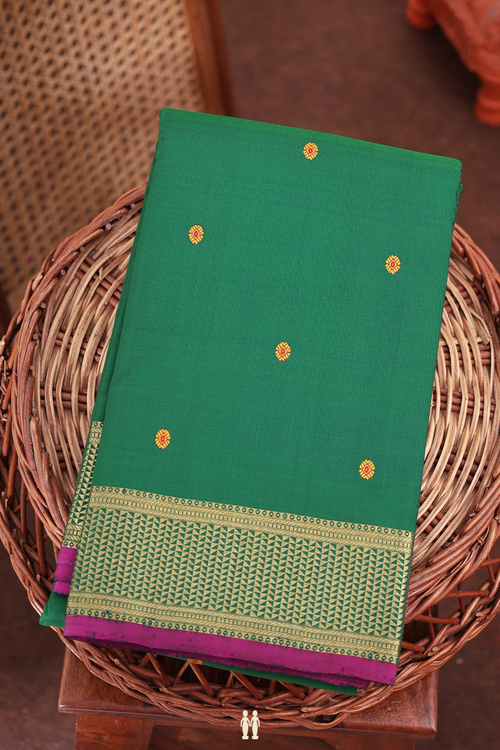 Kanchipuram Silk Saree In Emerald Green With Floral Buttis