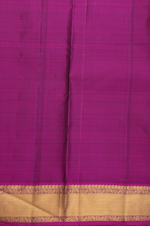 Kanchipuram Silk Saree In Emerald Green With Paisley Buttas
