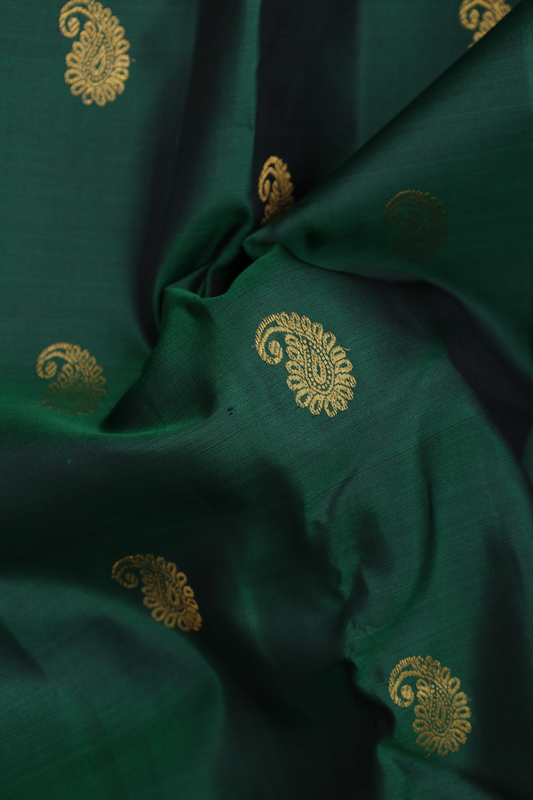 Kanchipuram Silk Saree In Emerald Green With Paisley Buttas