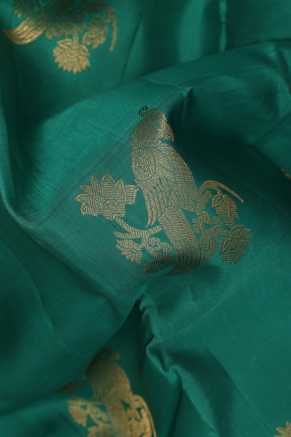 Kanchipuram Silk Saree In Emerald Green With Parrot Motifs