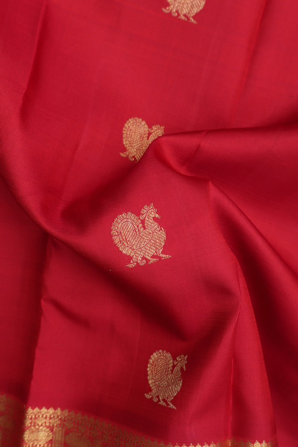 Kanchipuram Silk Saree In Chilli Red With Peacock Buttas