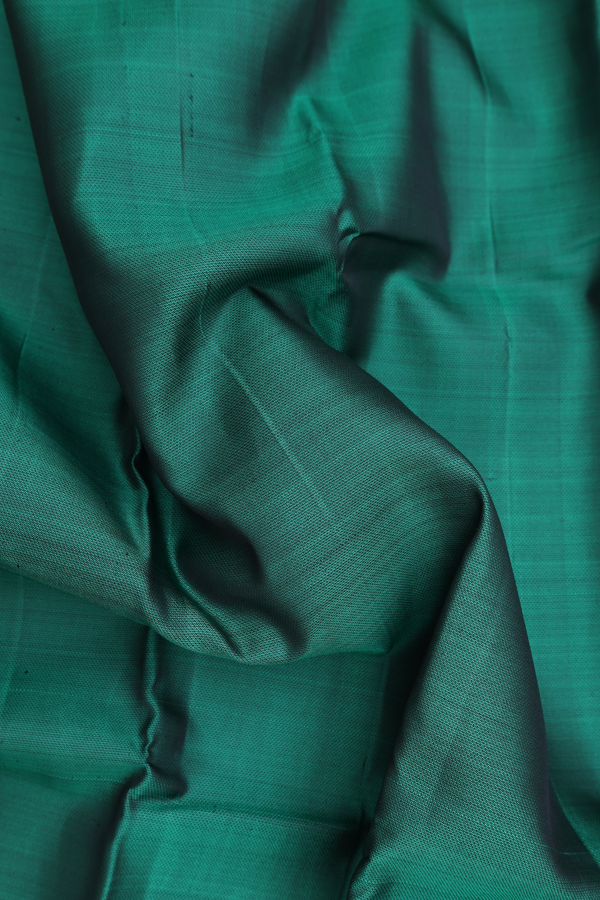 Kanchipuram Silk Saree In Emerald Green With Zari Border