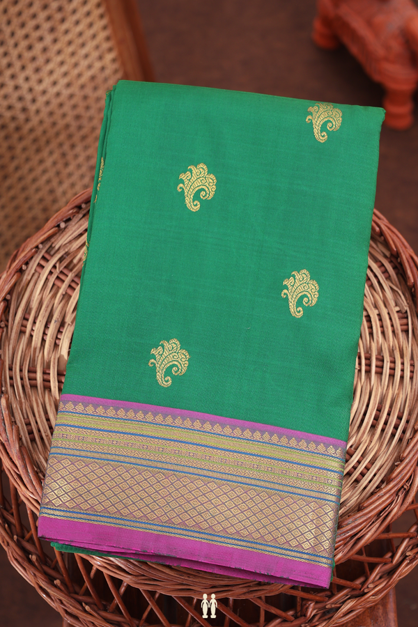 Kanchipuram Silk Saree In Emerald Green With Zari Buttas