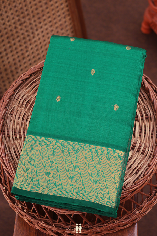 Kanchipuram Silk Saree In Emerald Green With Zari Buttas