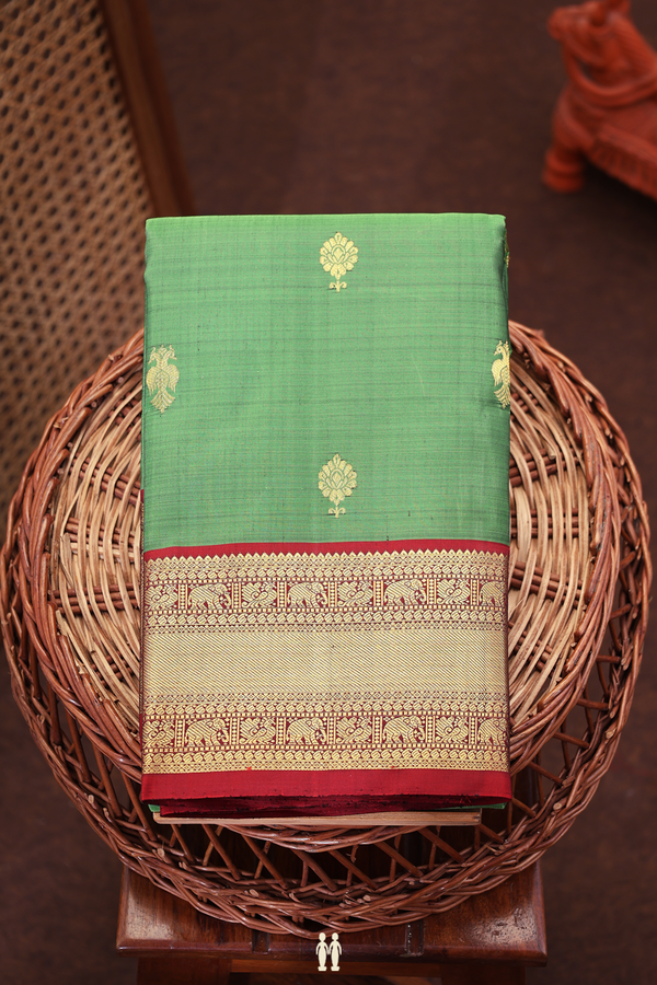 Kanchipuram Silk Saree In Fern Green With Floral Buttas