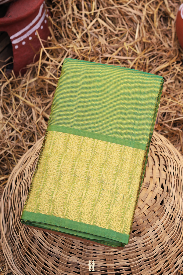 Kanchipuram Silk Saree In Parrot Green With Zari Border