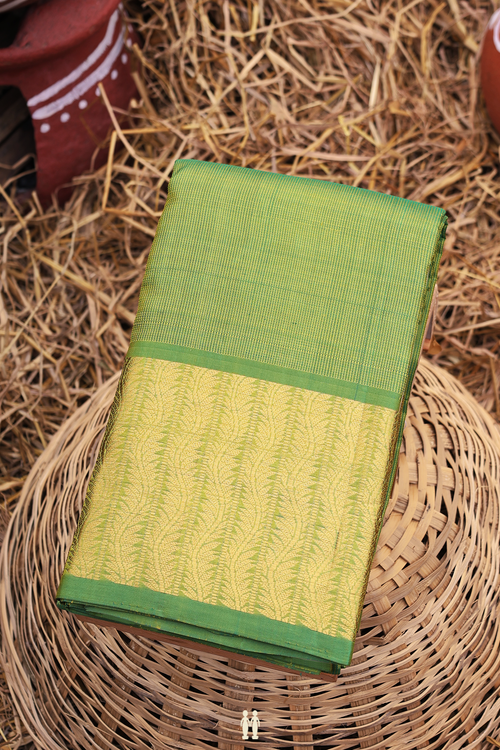 Kanchipuram Silk Saree In Parrot Green With Zari Border