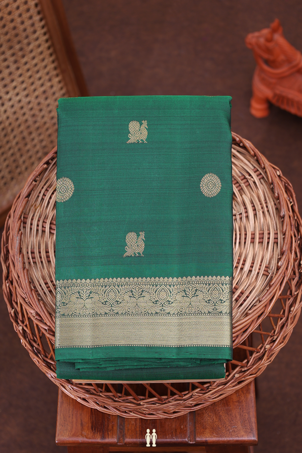 Kanchipuram Silk Saree In Forest Green With Peacock Buttas