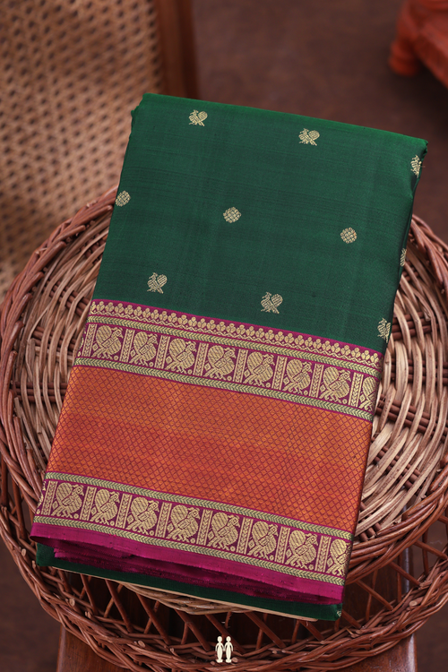 Kanchipuram Silk Saree In Forest Green With Peacock Buttas