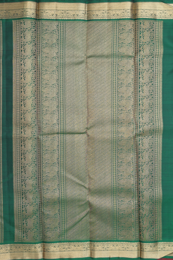 Kanchipuram Silk Saree In Forest Green With Peacock Buttas
