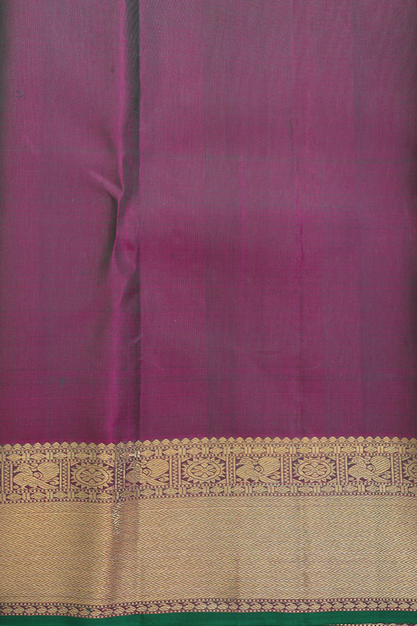Kanchipuram Silk Saree In Forest Green With Peacock Buttas