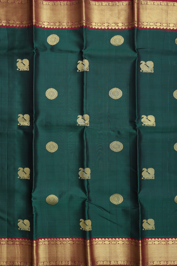 Kanchipuram Silk Saree In Forest Green With Peacock Buttas