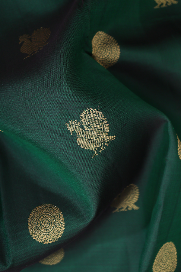 Kanchipuram Silk Saree In Forest Green With Peacock Buttas