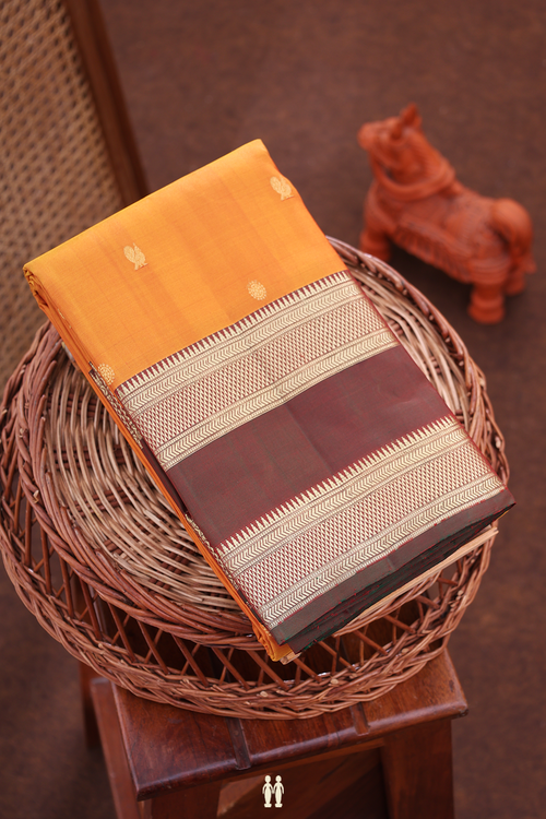 Kanchipuram Silk Saree In Ginger Orange With Floral Buttas