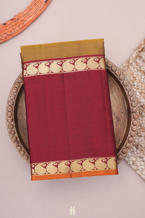 Kanchipuram Silk Saree In Golden Brown With Chakram Buttas
