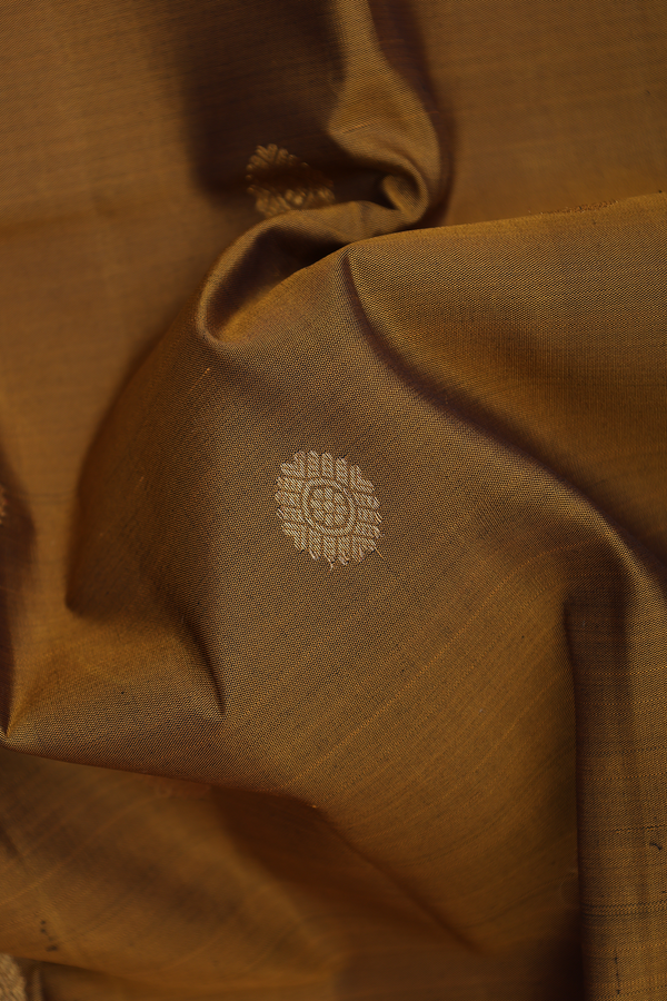 Kanchipuram Silk Saree In Golden Brown With Chakram Buttas