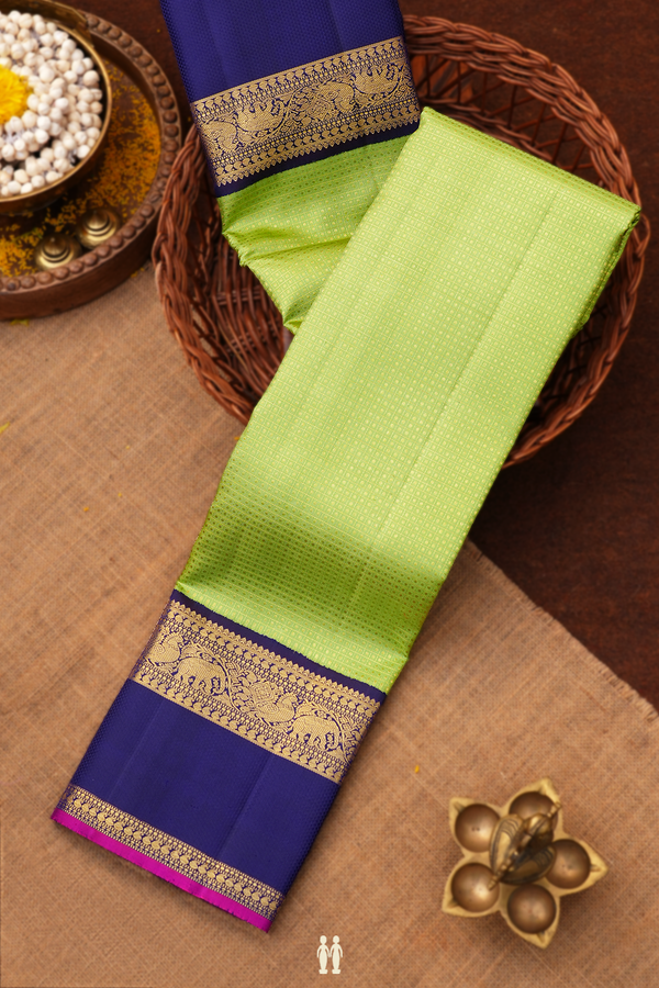 Kanchipuram Silk Saree In Green Along Checks With Buttis