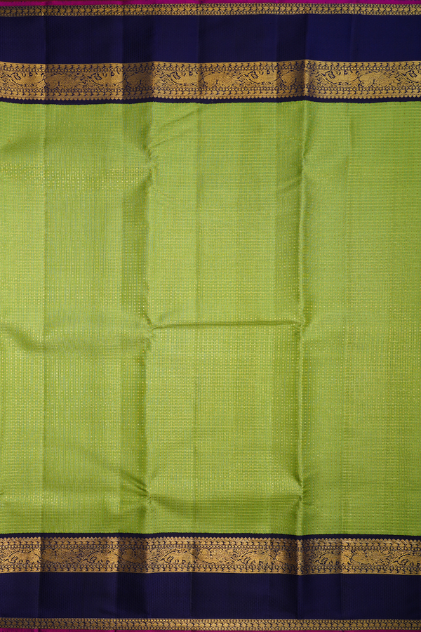 Kanchipuram Silk Saree In Green Along Checks With Buttis