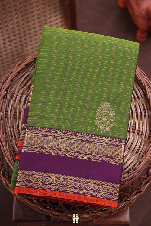 Kanchipuram Silk Saree In Green Along Stripes With Motifs
