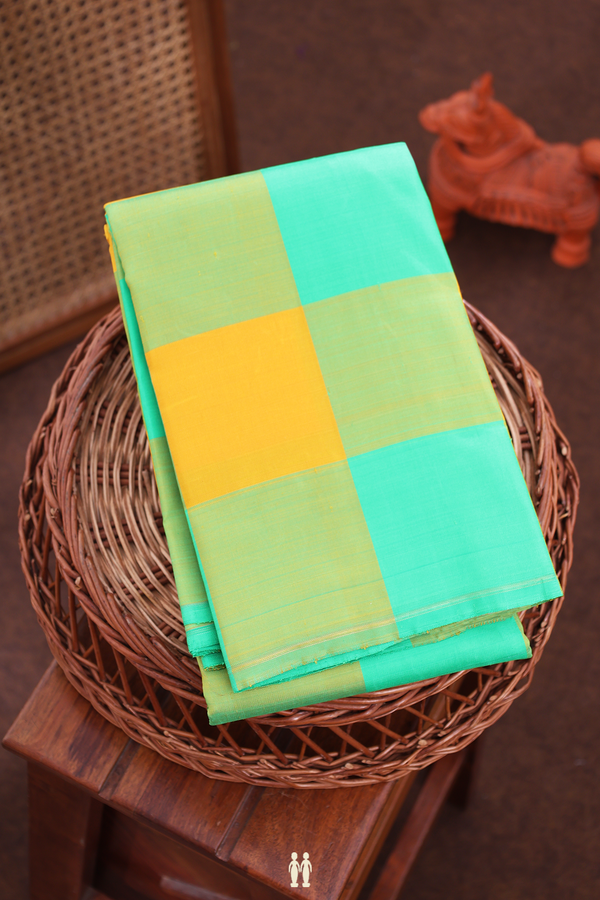 Kanchipuram Silk Saree In Green And Yellow With Checks Design