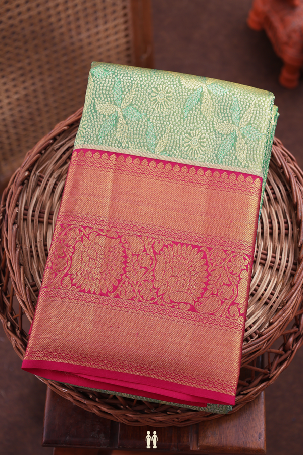Kanchipuram Silk Saree In Green Tissue With Floral Border