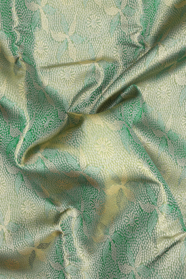 Kanchipuram Silk Saree In Green Tissue With Floral Border