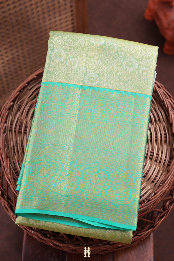 Kanchipuram Silk Saree In Green Tissue With Floral Design