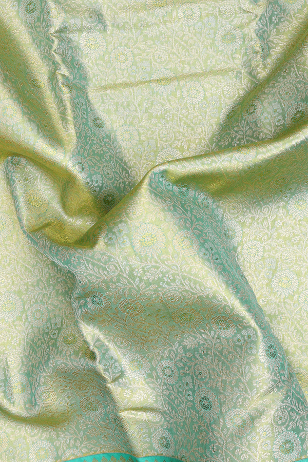 Kanchipuram Silk Saree In Green Tissue With Floral Design