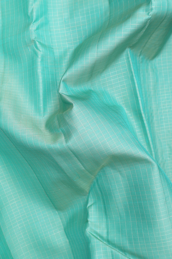 Kanchipuram Silk Saree In Green With Checks Design