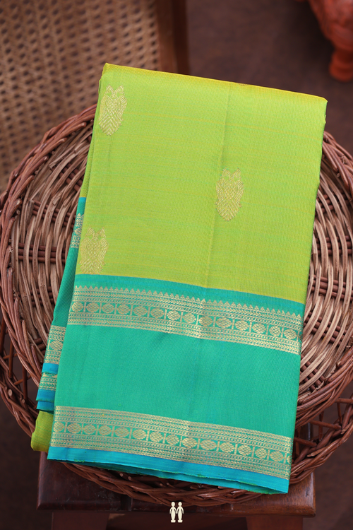 Kanchipuram Silk Saree In Green With Iruthalai Pakshi Buttas