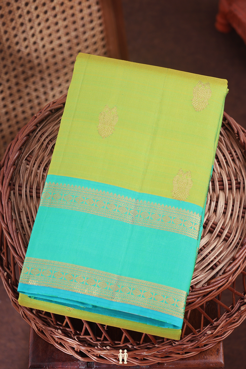 Kanchipuram Silk Saree In Green With Iruthalai Pakshi Buttas