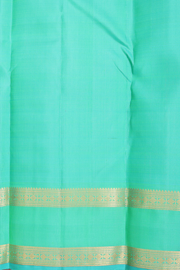 Kanchipuram Silk Saree In Green With Iruthalai Pakshi Buttas