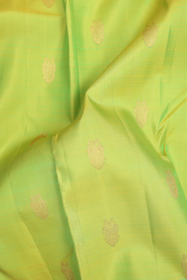 Kanchipuram Silk Saree In Green With Iruthalai Pakshi Buttas
