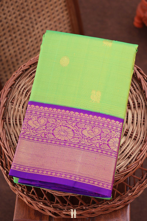 Kanchipuram Silk Saree In Green With Peacock Buttas