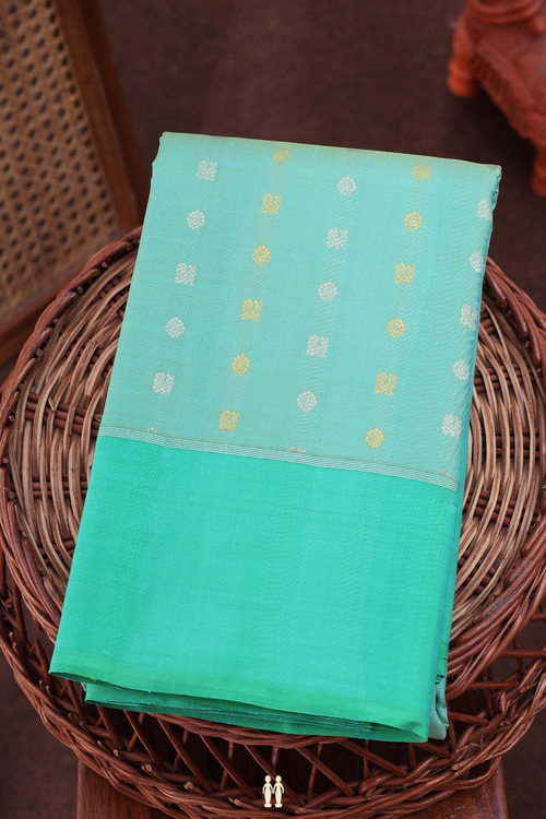 Kanchipuram Silk Saree In Green With Peacock Buttas