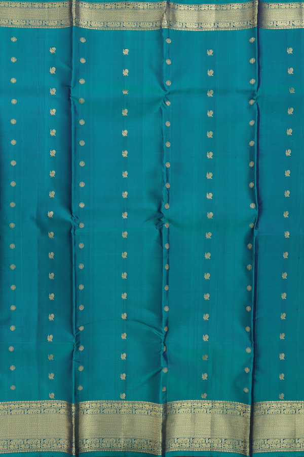 Kanchipuram Silk Saree In Green With Peacock Chakram Buttas
