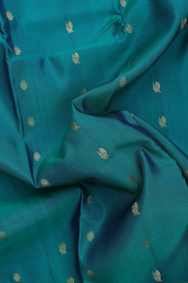 Kanchipuram Silk Saree In Green With Peacock Chakram Buttas