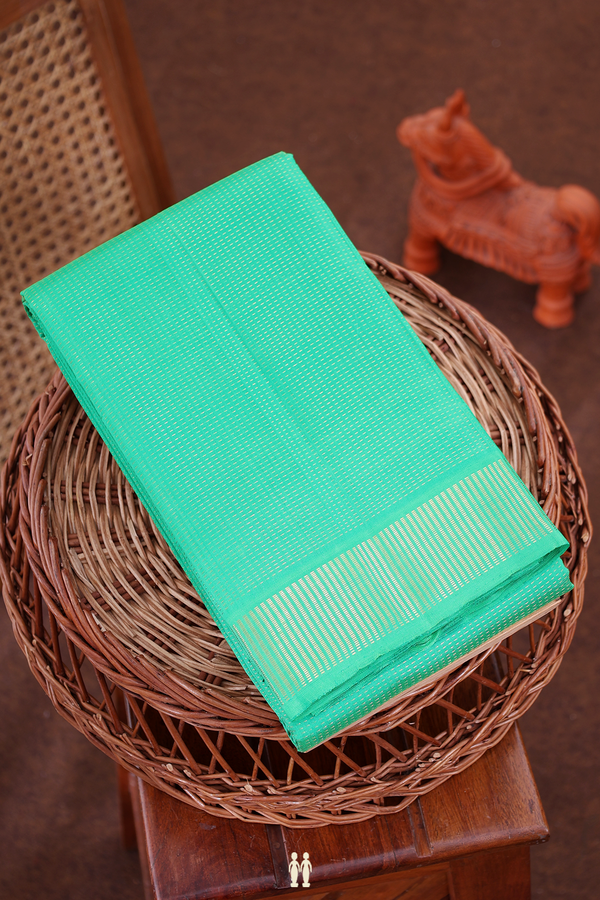 Kanchipuram Silk Saree In Green With Stripes Design