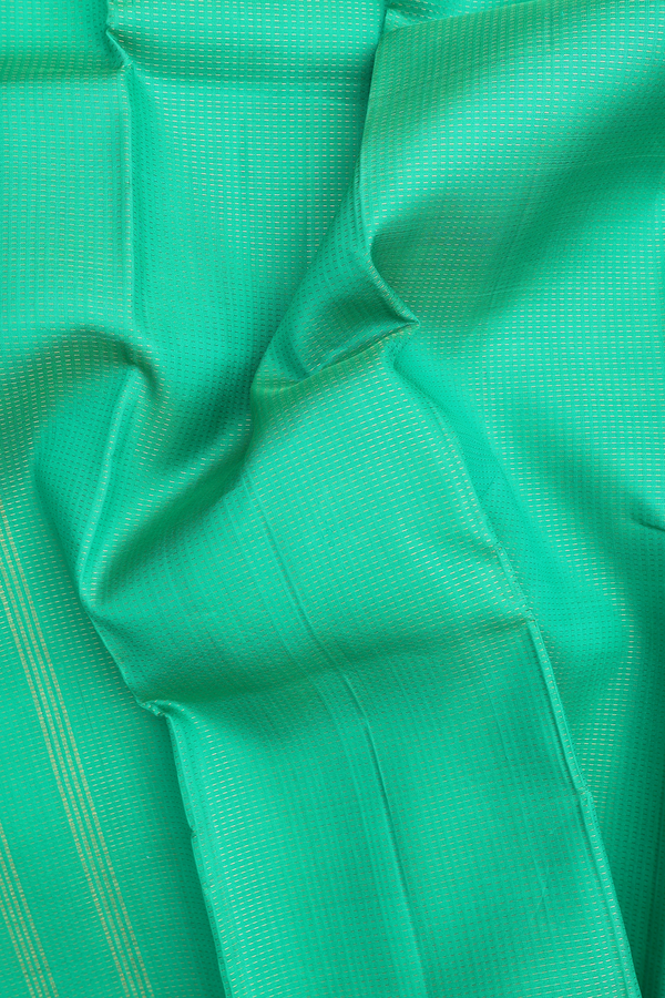 Kanchipuram Silk Saree In Green With Stripes Design