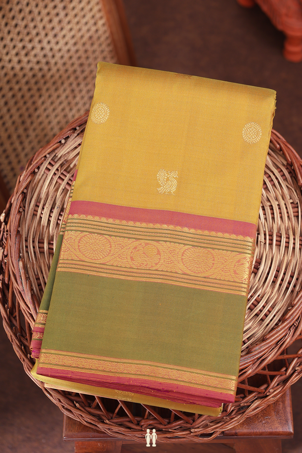 Kanchipuram Silk Saree In Golden Brown With Peacock Buttas