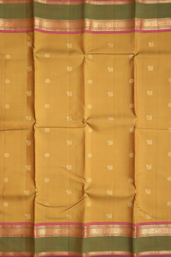 Kanchipuram Silk Saree In Golden Brown With Peacock Buttas