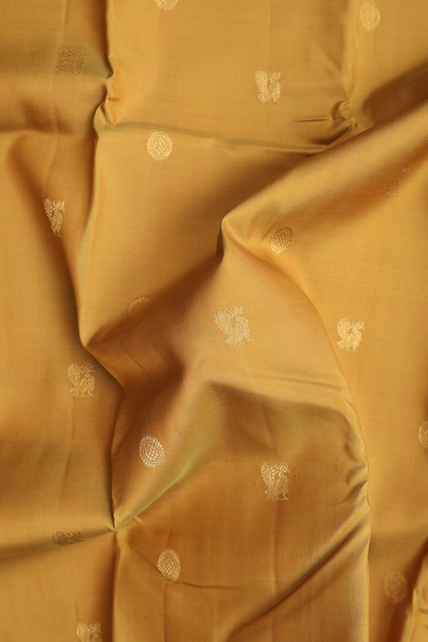Kanchipuram Silk Saree In Golden Brown With Peacock Buttas