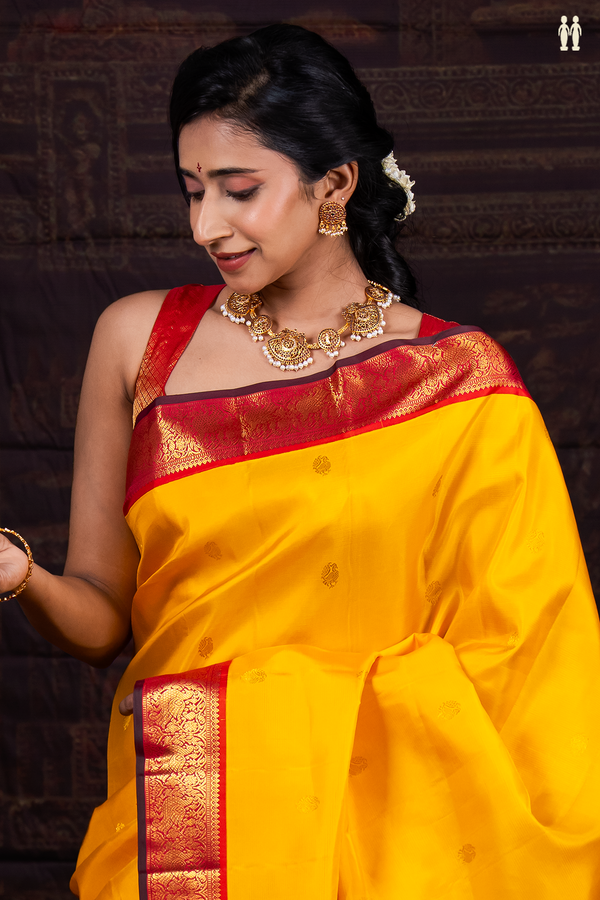 Kanchipuram Silk Saree In Honey Yellow With Peacock Buttas