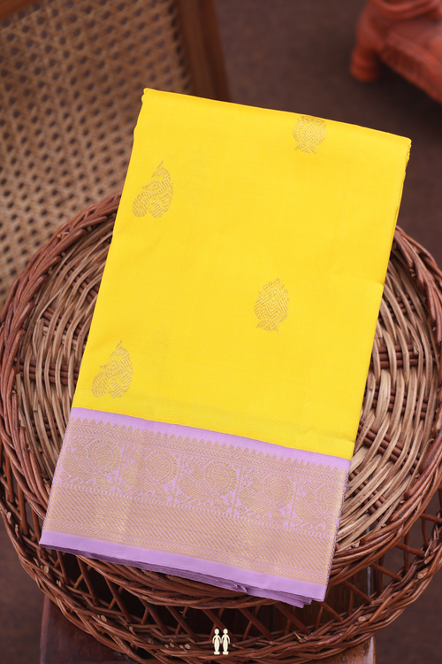 Kanchipuram Silk Saree In Honey Yellow With Peacock Buttas